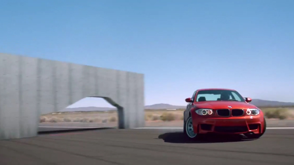 BMW 1M Coupe drifts through walls