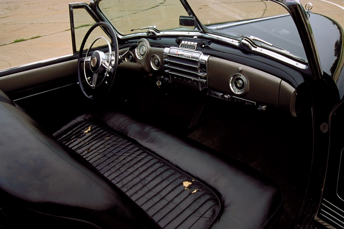 After the restoration work that has been done on it, the car still shows the wear and tear from when Harley Earl drove it daily.