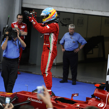 Alonso takes win in wet race in Sepang